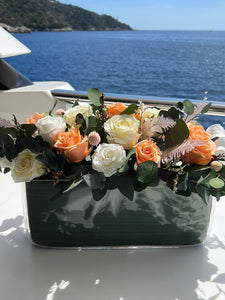 Preserved flower arrangement for MY SOSA. Orange and Cream flowers